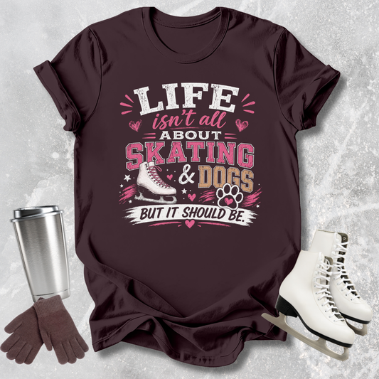 Maroon t-shirt t-shirt with 'Life isn't all about skating & dogs but it should be' text and graphics on a textured gray background.