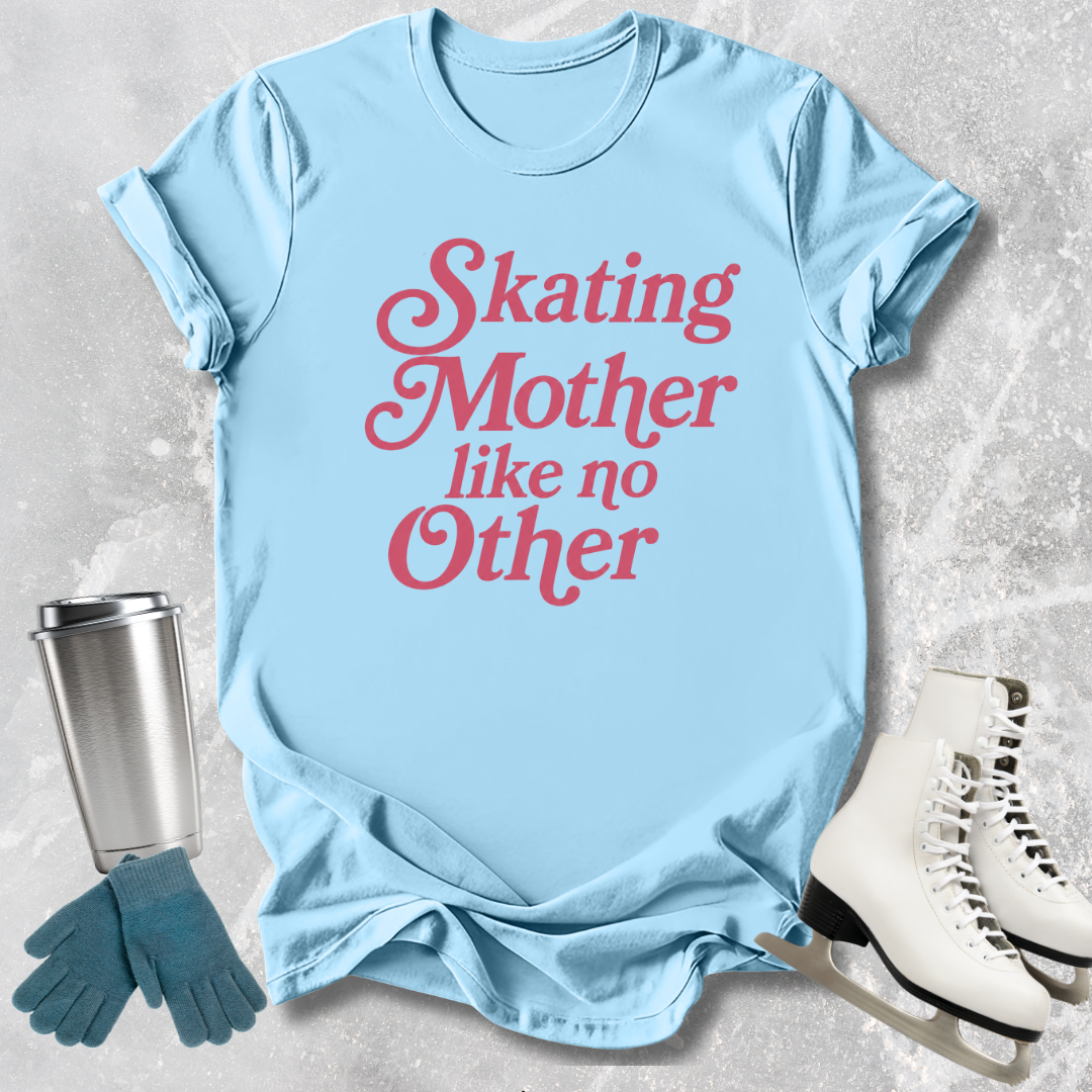 Light blue t-shirt with red text 'Skating Mother like no Other' on a textured surface with accessories.