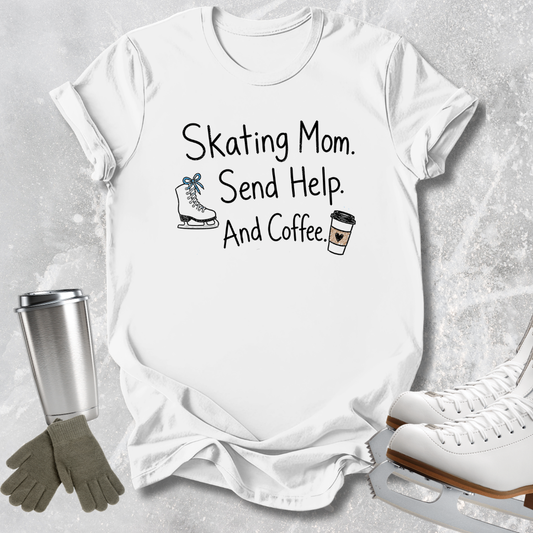A white graphic t-shirt laid flat on a light gray textured background, featuring the text 'Skating Mom. Send Help.