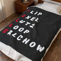 A black throw blanket with the word 'ROACH' spelled out in large white and red letters, draped over a bed in a bedroom setting.