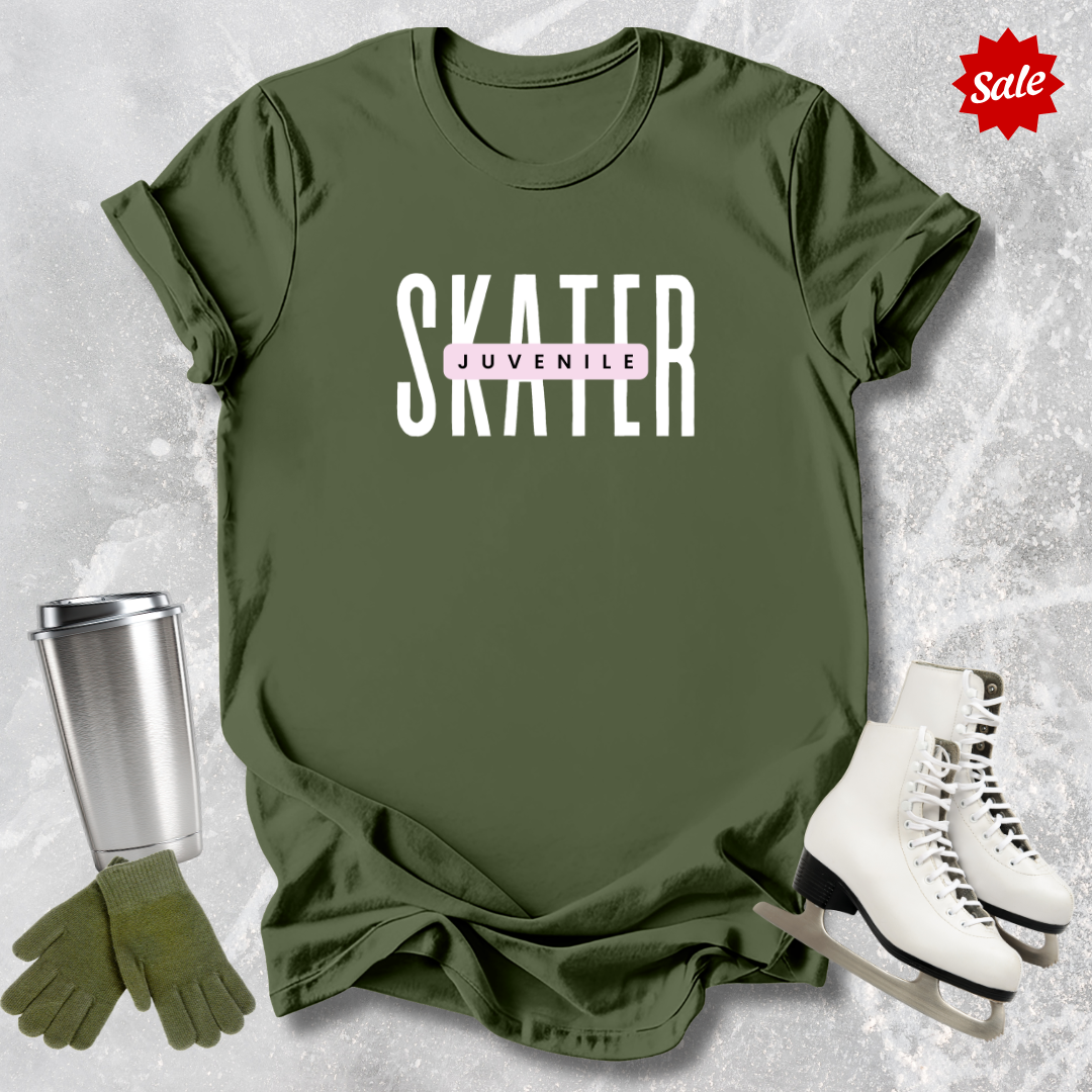 Green t-shirt with 'SKATER' and 'juveniles' text, paired with white skates, green gloves, and a silver tumbler on a textured gray background.