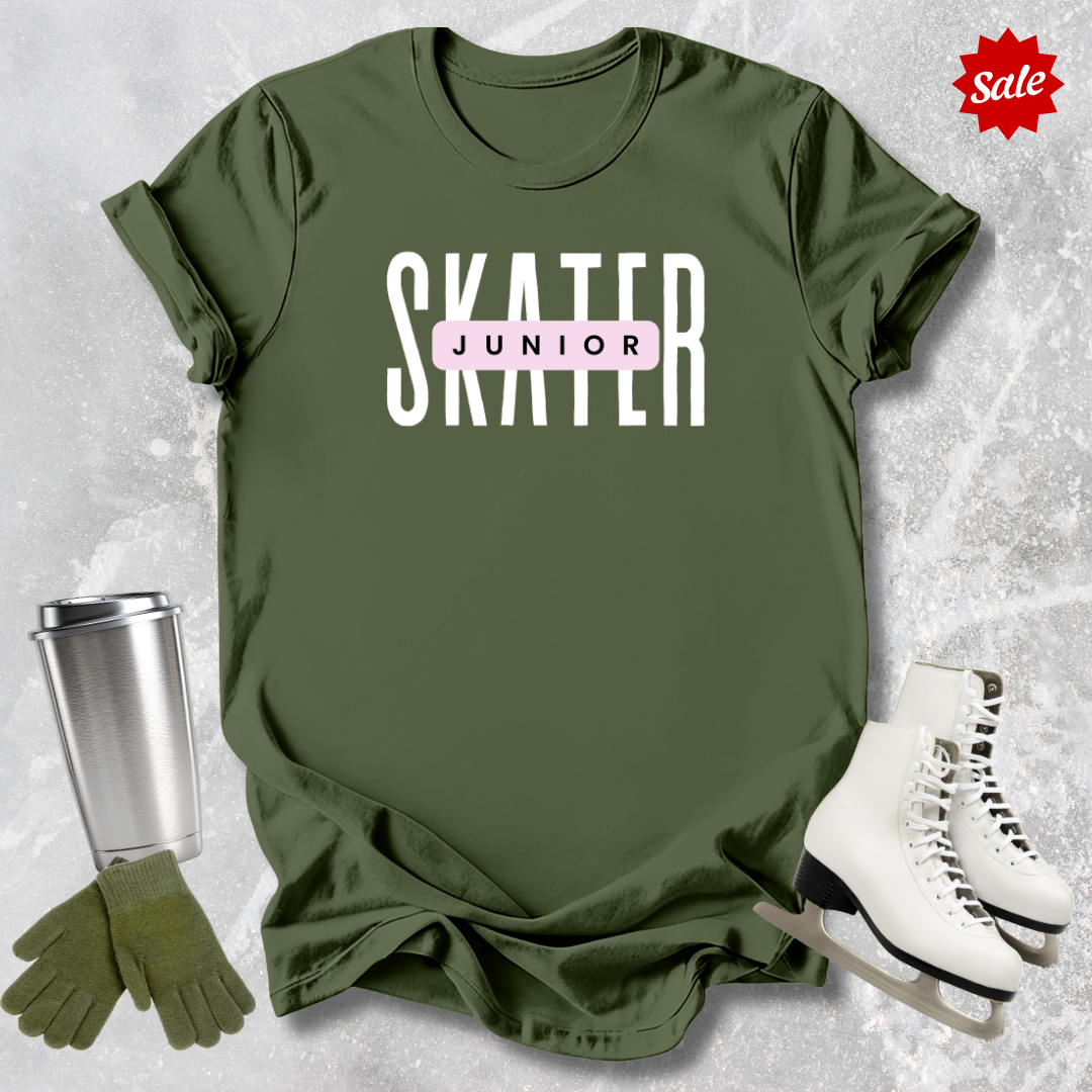 Green t-shirt with 'SKATER' text, silver tumbler, green gloves, and white skates on a textured gray background.