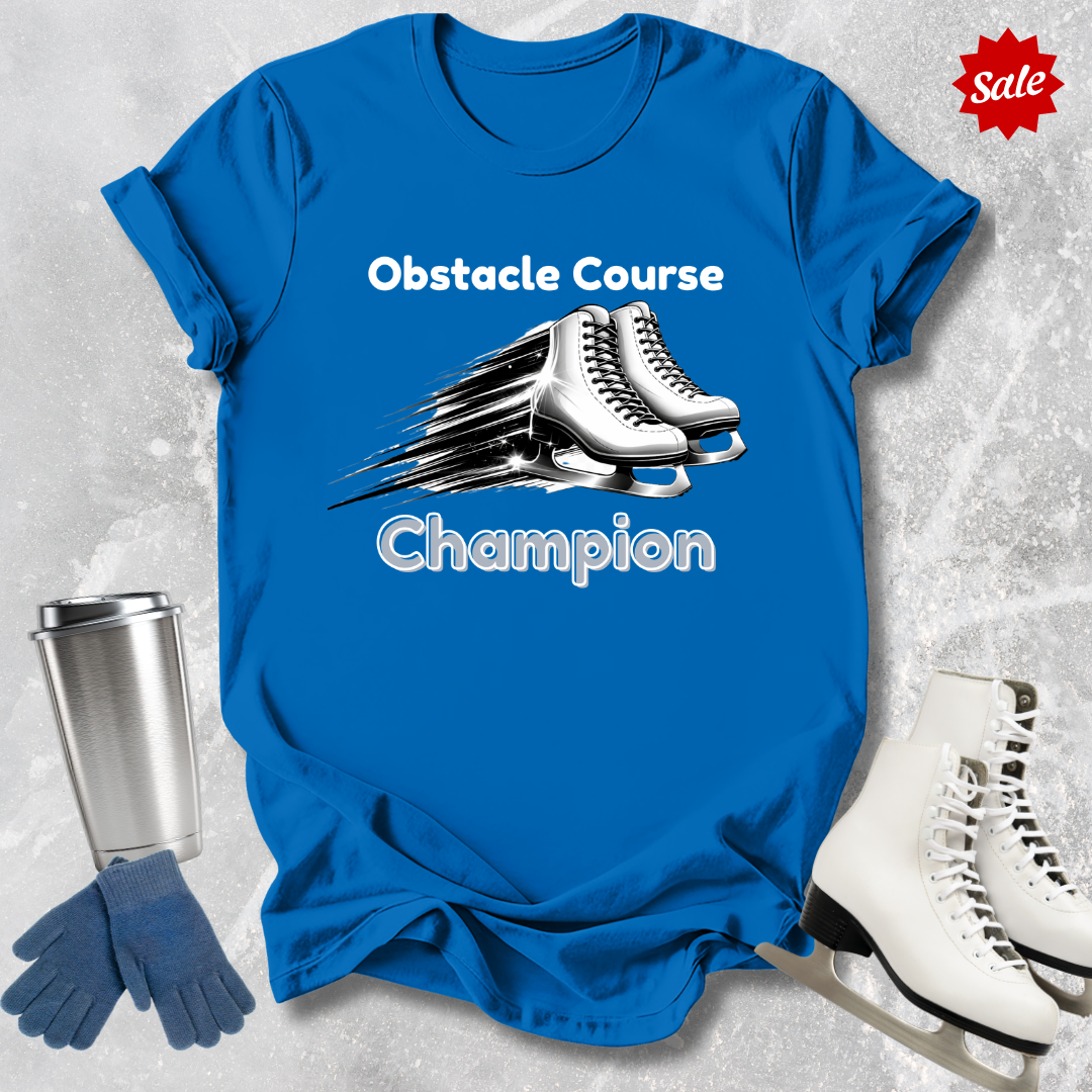 Blue t-shirt with ice skate design and text, surrounded by ice skates and a tumbler on a textured background.