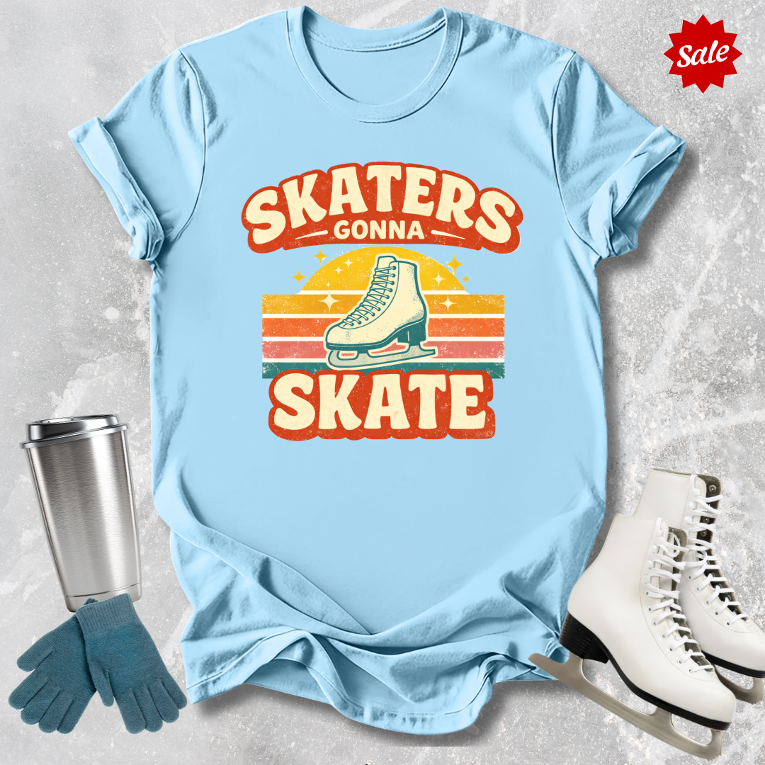 Light blue t-shirt  with figure skaters gonna skate retro graphic design