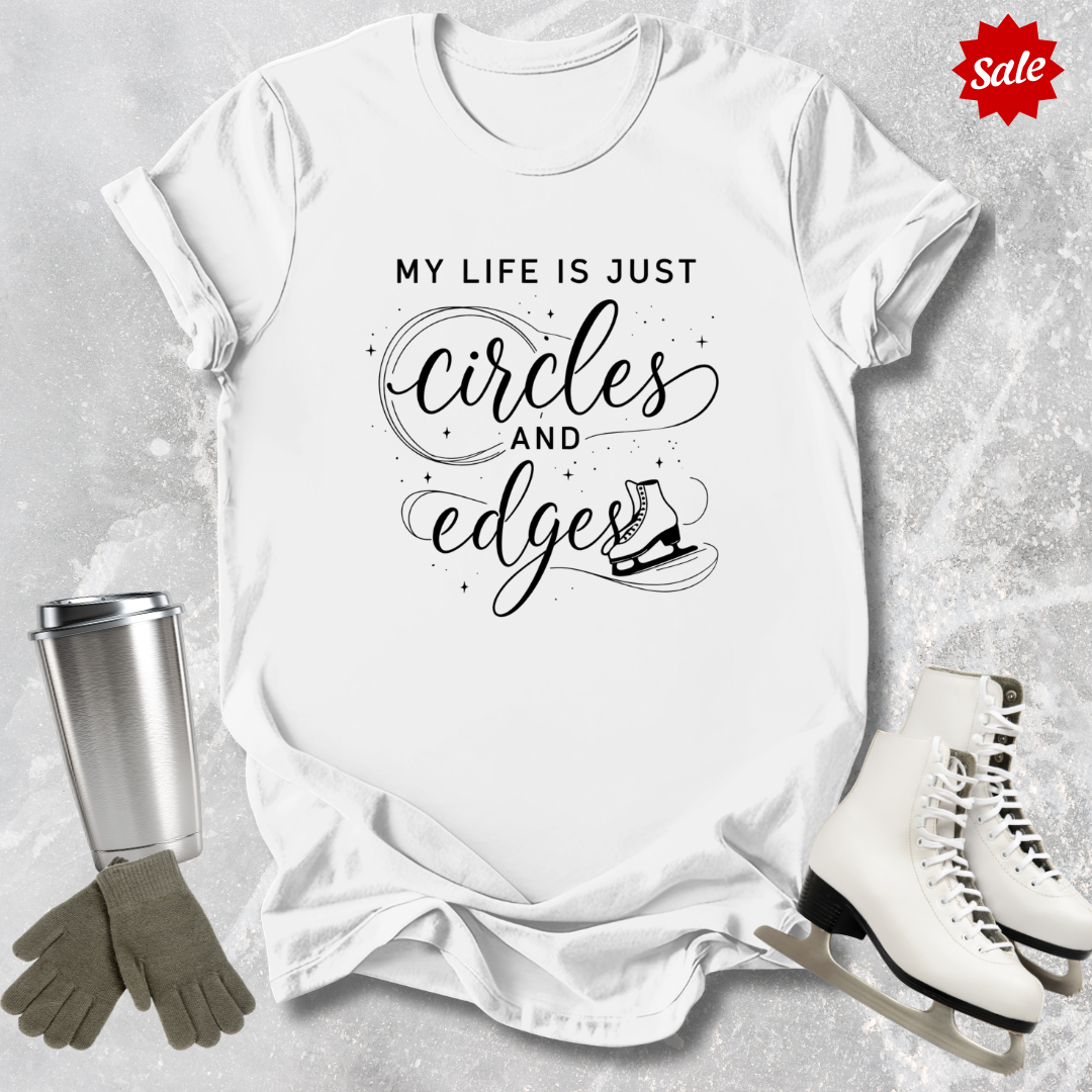 White t-shirt with My Life is just circles and edges Figure Skating text 'My life is just circles and edges' on a gray textured background with a sale label.