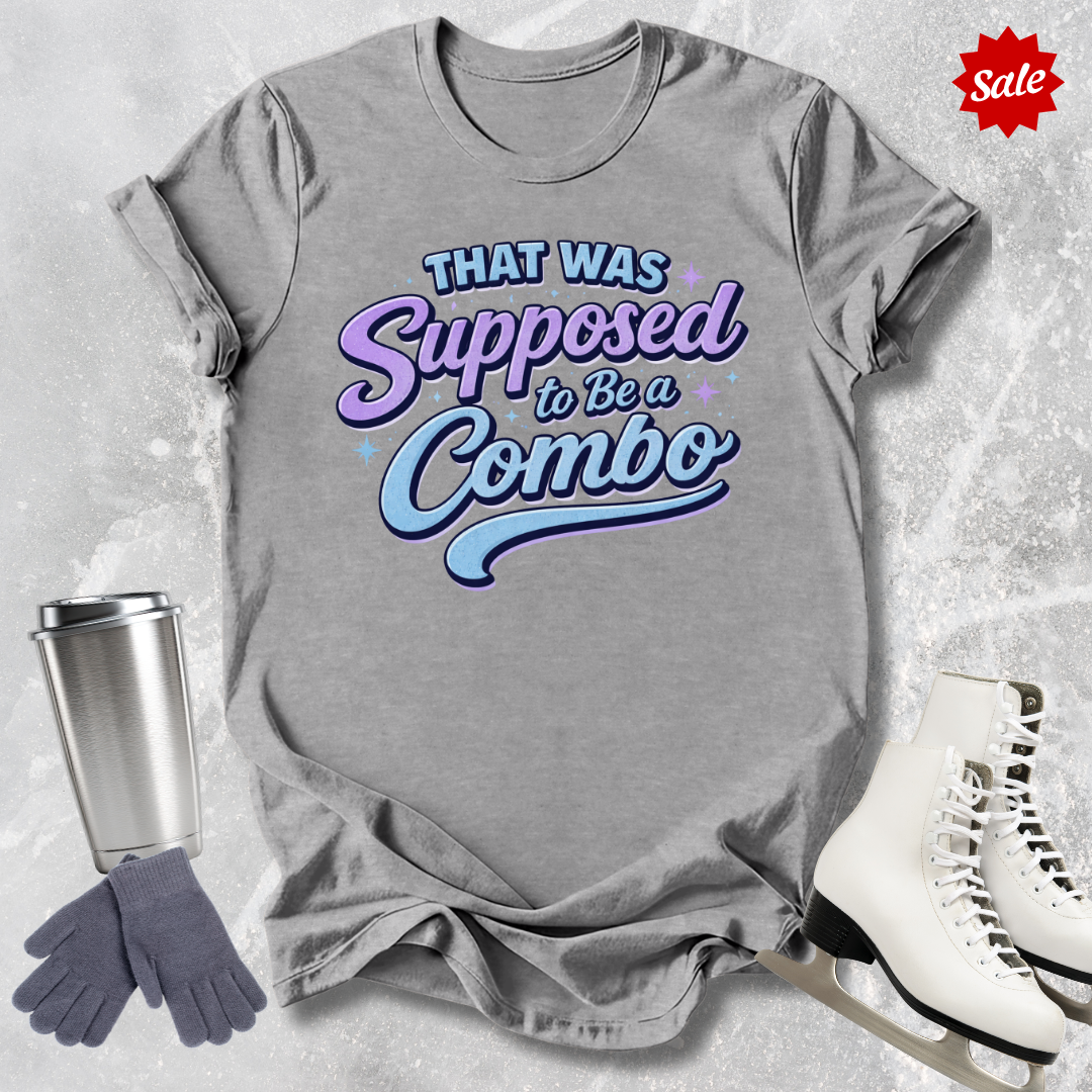 Gray t-shirt with colorful figure skating that was supposed to be a combo text, silver tumbler, gray gloves, and white skates on a textured surface.