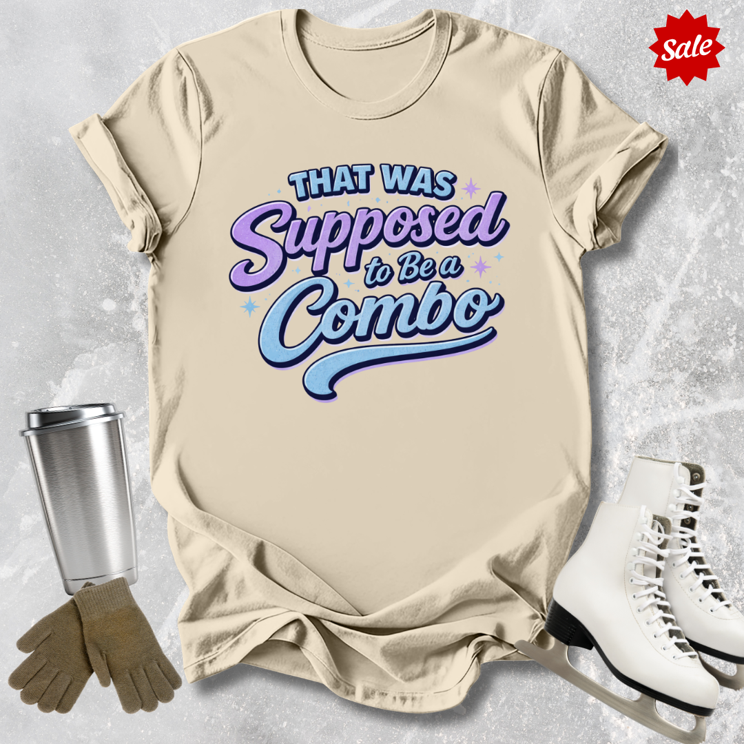 Beige t-shirt with colorful figure skating that was supposed to be a combo text, silver tumbler, brown gloves, and white skates on a light gray background.