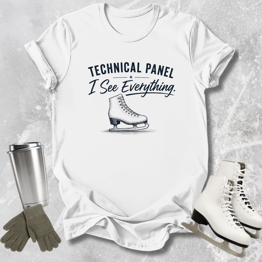 White t-shirt with 'Technical Panel I See Everything' text and ice skate graphic, surrounded by ice skates and a tumbler.