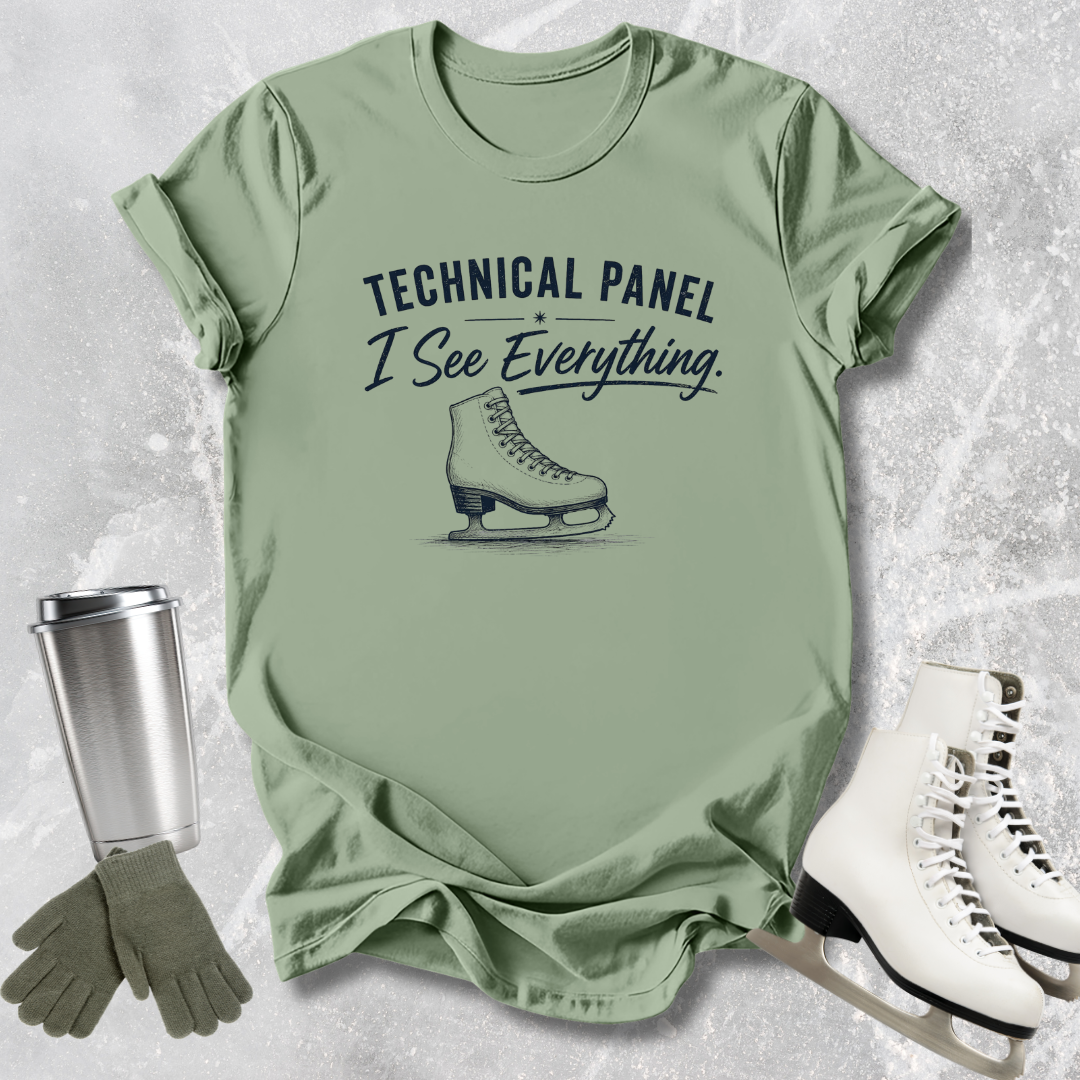 Green t-shirt with text and ice skate graphic, paired with white skates and a tumbler on a textured surface.