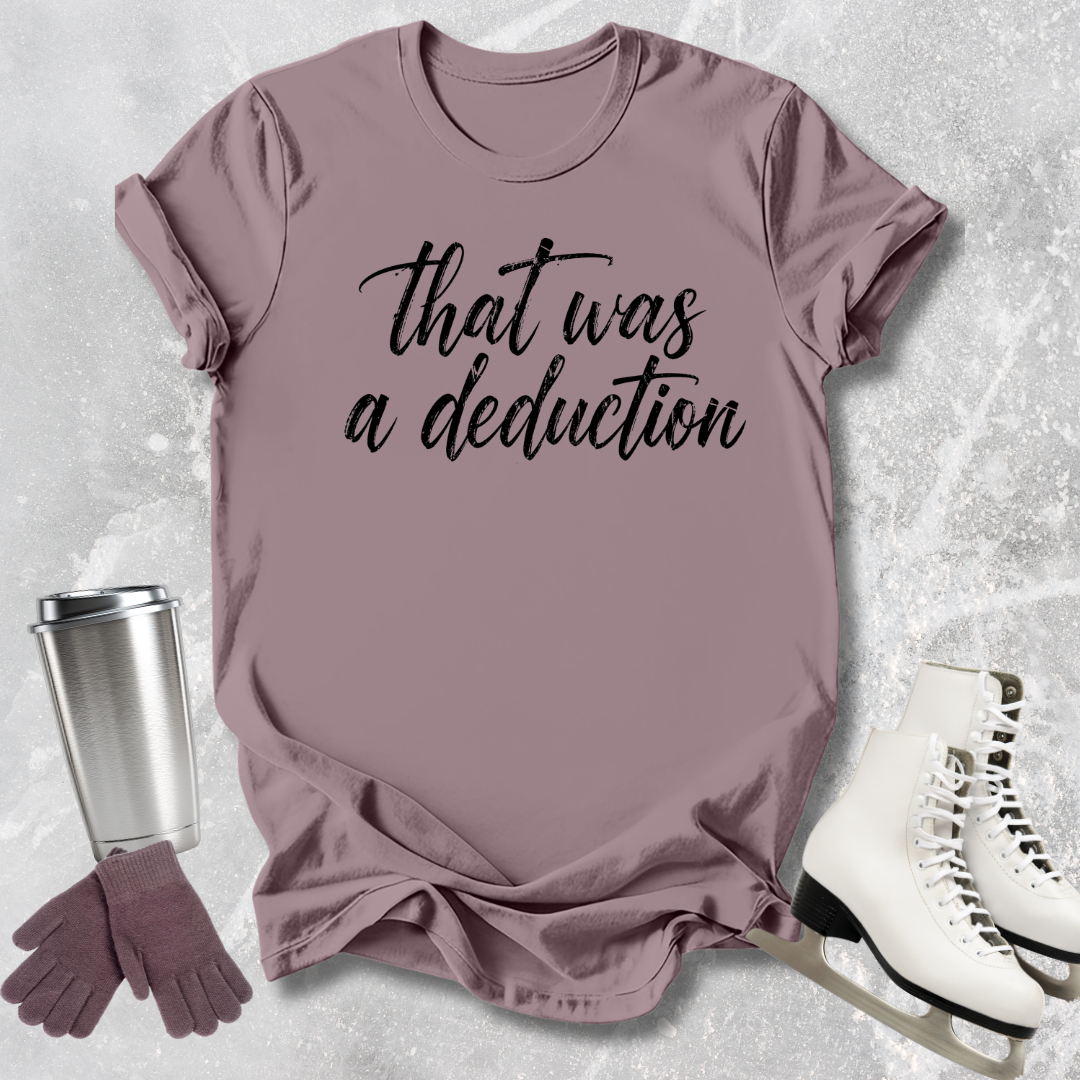 Mauve t-shirt with 'that was a deduction' text, silver tumbler, purple gloves, and white skates on a textured gray background