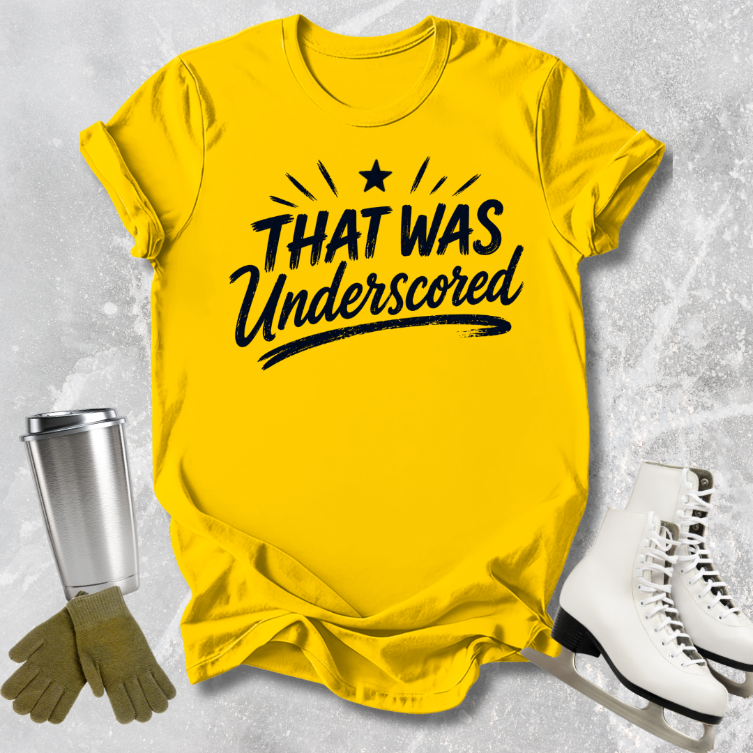 Yellow t-shirt with text, silver tumbler, green gloves, and white skates on a textured gray background