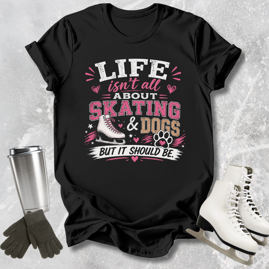 Black t-shirt with 'Life isn't all about skating & dogs but it should be' text and graphics on a textured gray background.