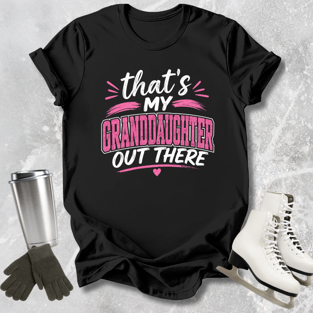 Black t-shirt with 'That's my granddaughter out there' text on a textured surface with accessories.