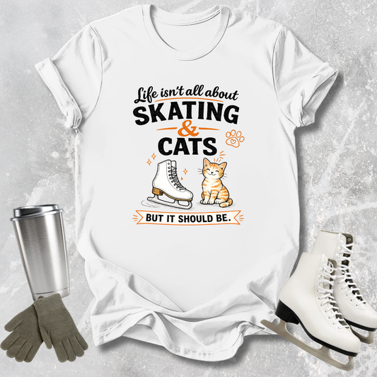 White t-shirt with skating and cats graphic and text on a textured gray background