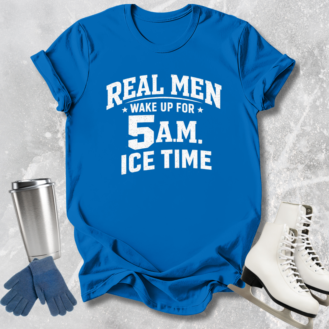 Blue t-shirt with text 'Real men wake up for 5 AM. Ice time' on a textured gray background.