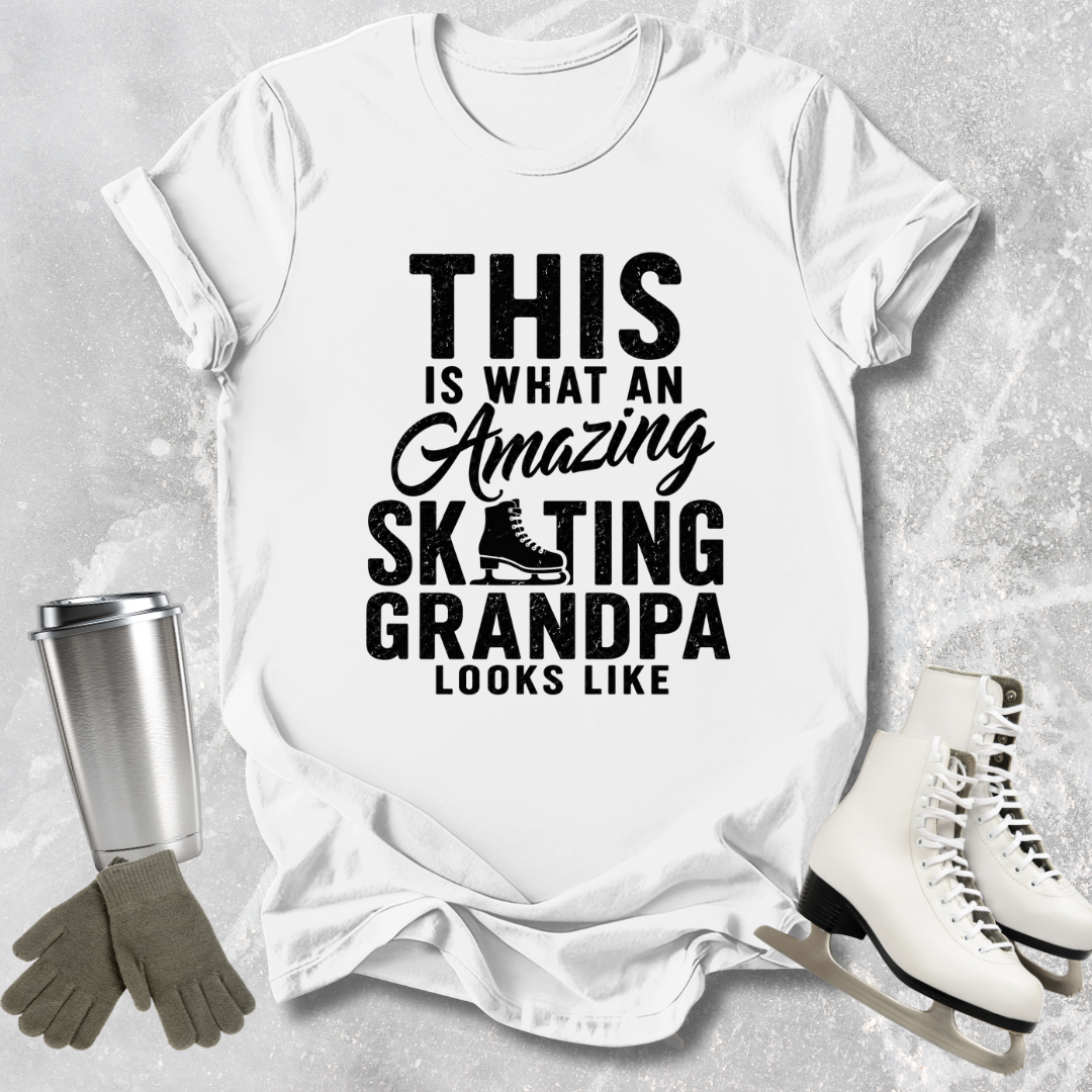 White t-shirt with text 'This is what an amazing skating grandpa looks like' on a textured gray background.