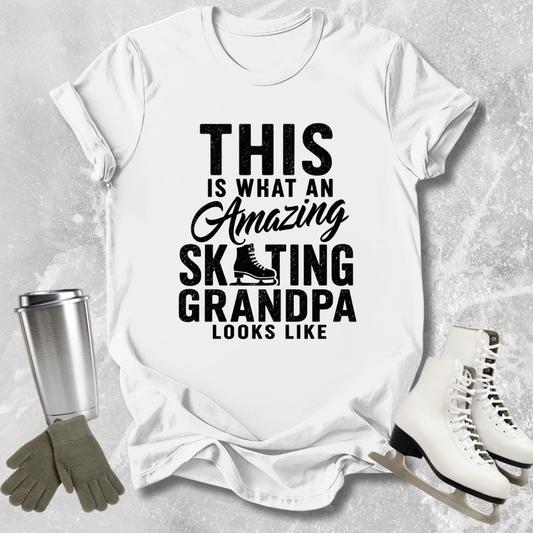 White t-shirt with text 'This is what an amazing skating grandpa looks like' on a textured gray background.