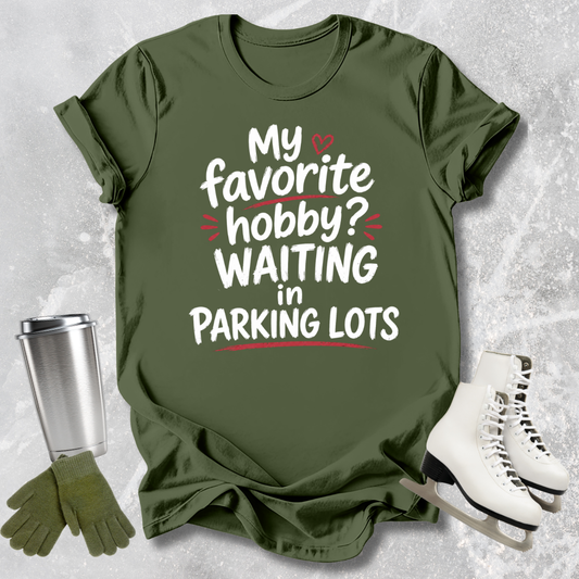 Green t-shirt with humorous text, paired with a silver tumbler, green gloves, and white shoes on a textured background.