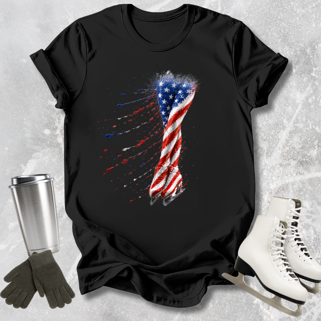 Black t-shirt with American flag design on a textured surface with accessories.
