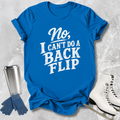 Blue t-shirt with 'No, I can't do a backflip' text on a textured surface with accessories.