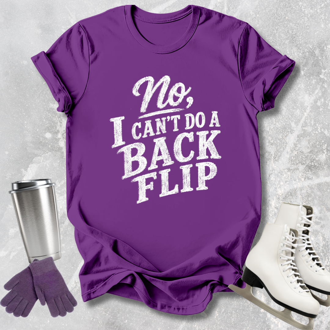 Purple t-shirt with 'No, I can't do a backflip' text, next to white ice skates and a silver tumbler on a textured gray background.