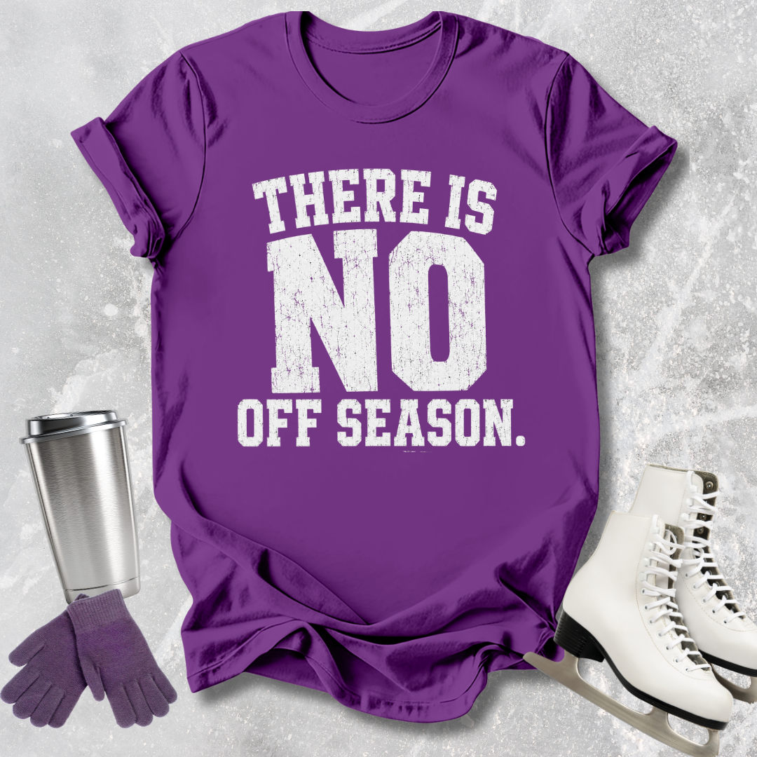 Purple t-shirt with 'There is no off season' text, next to a silver tumbler, purple gloves, and white skates on a textured gray background.