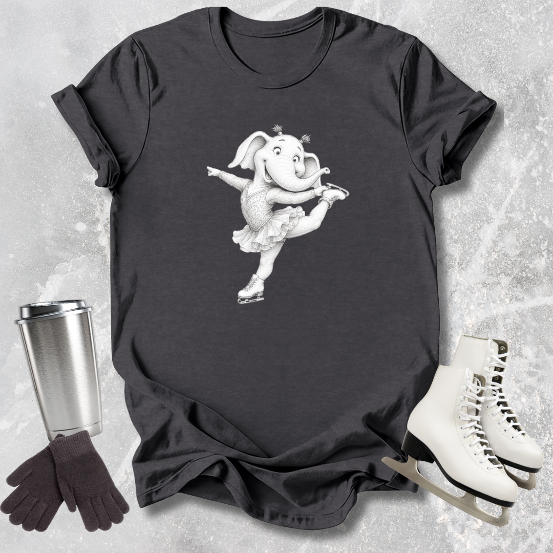 Black t-shirt with a cartoon elephant design, next to a silver tumbler, black gloves, and white skates on a textured surface.