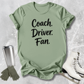 Green t-shirt with 'Coach. Driver.