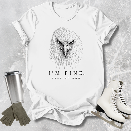 White t-shirt with an eagle graphic and text, surrounded by a silver tumbler, green gloves, and white skates on a textured gray background.