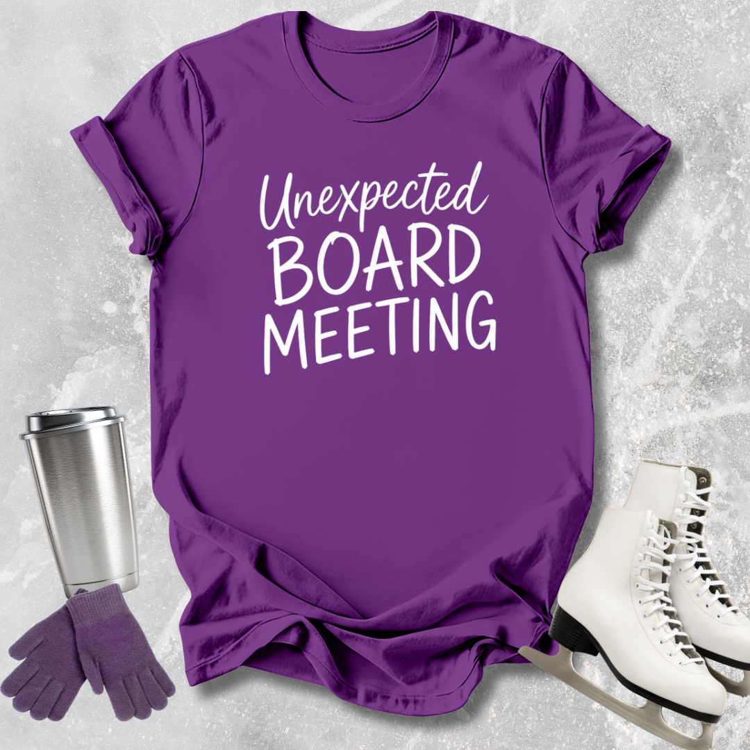 Purple t-shirt with 'Unexpected Board Meeting' text, silver tumbler, purple gloves, and white skates on a textured gray background.