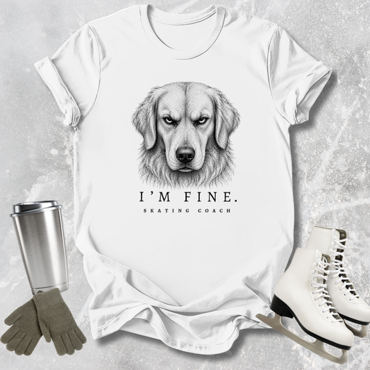 White t-shirt with a dog graphic and text, surrounded by a tumbler, gloves, and ice skates on a textured surface.