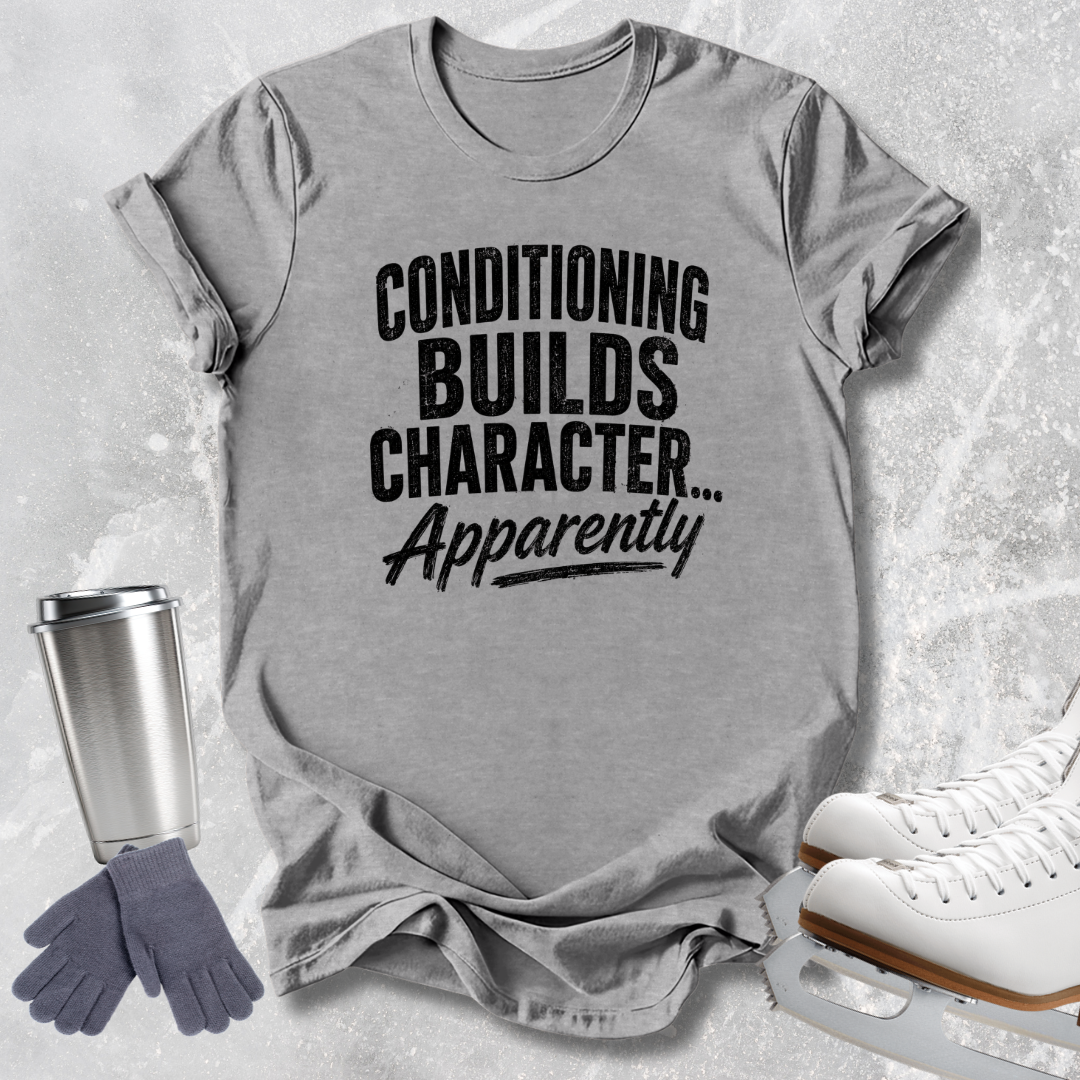 A heather gray short-sleeve T-shirt laid flat on a light textured background, printed with the phrase 'CONDITIONING BUILDS CHARACTER.