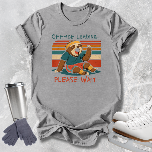 A heather gray graphic t-shirt featuring a cartoon sloth sitting in front of a retro striped background with the text 'OFF-ICE LOADING.