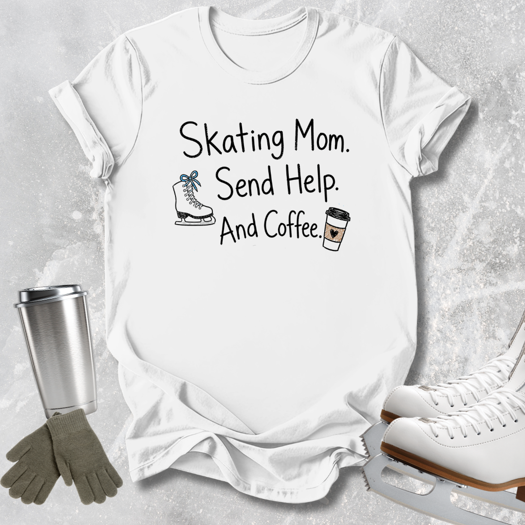 A white graphic t-shirt laid flat on a light gray textured background, featuring the text 'Skating Mom. Send Help.