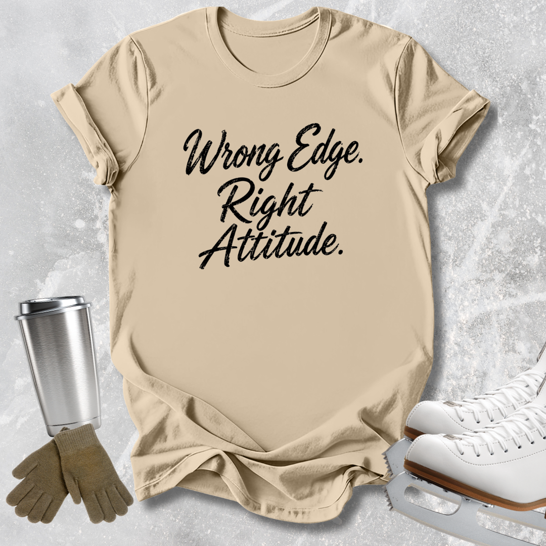 A beige graphic t-shirt with the text 'Wrong Edge. Right Attitude.